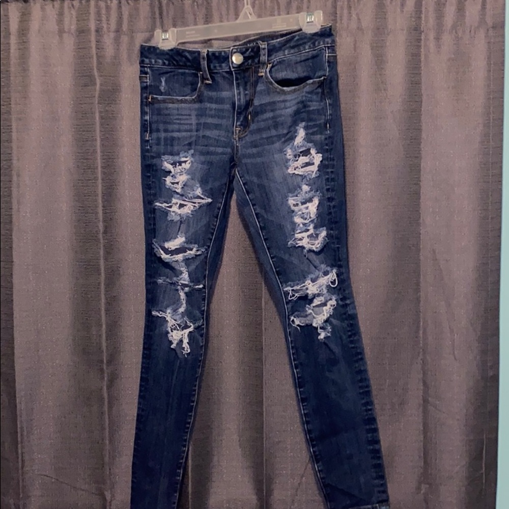 blue ripped jeans